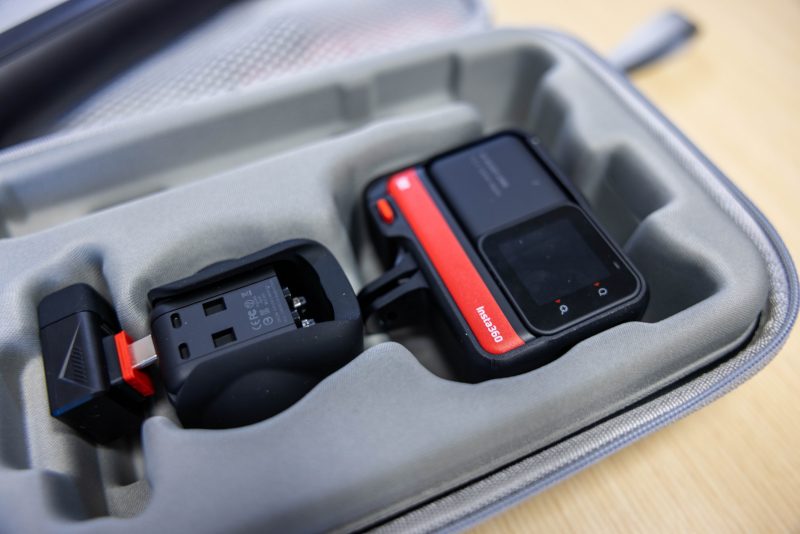 An Insta360 camera in its case