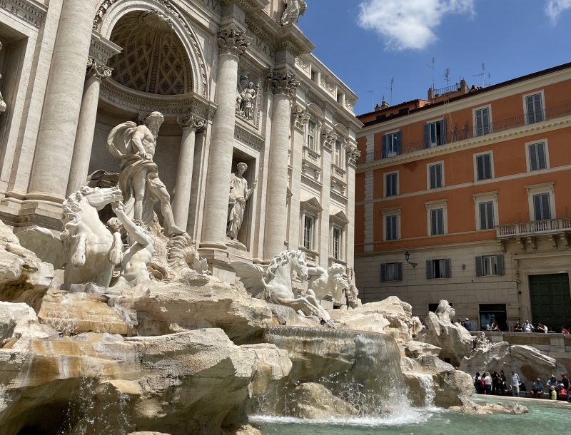 A fountain featuring a carved statue of a man